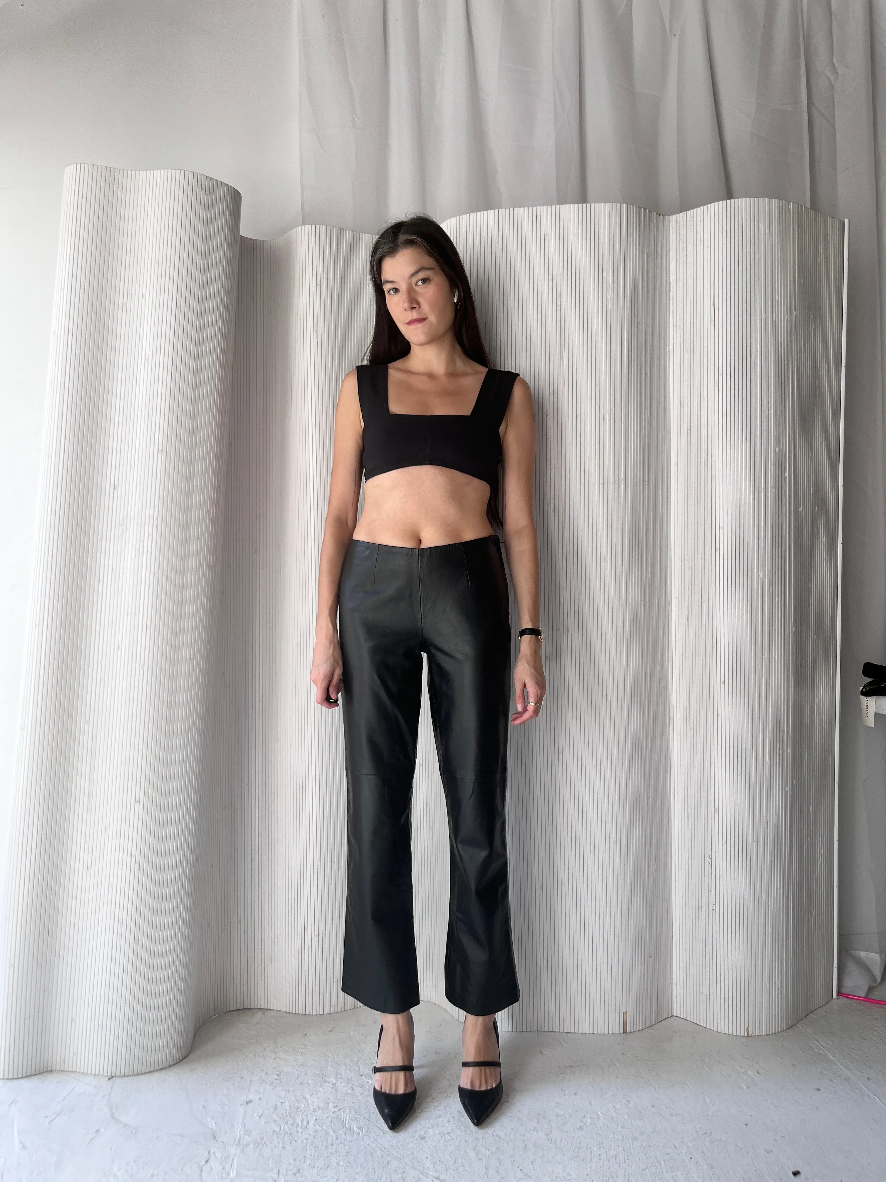 Black leather low rise pants